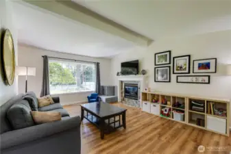 Need we say more about this spacious, comfortable living room with the huge window looking over your front yard enclosed by the white picket fence?