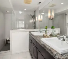 Owner Suite bathroom with storage, 2 sinks, and huge shower!