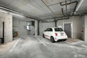 Two parking spaces + room to store items