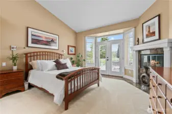 Large primary suite with private access to deck and walk-in-closet