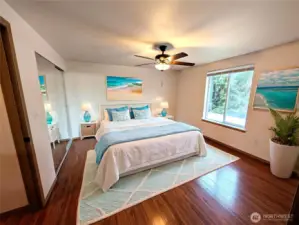 Primary bedroom suite. Light and bright on the upper level. Virtually staged to show versatility