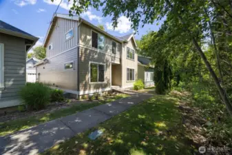 Welcome to 6214 Malloy Ave. This home looks out to a forested ravine and open space. The sidewalk is from Malloy Avenue as the driveway comes to the rear of the home.