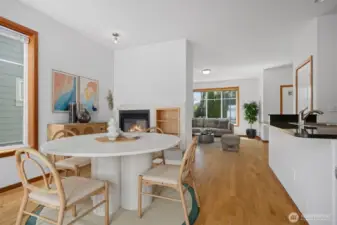 Looking from the dining room toward the living area with the eating bar on the right.