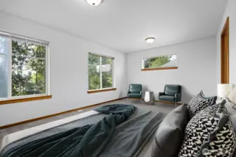 Looking across the large primary suite.