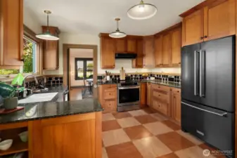 New range, new dishwasher, newer refrigerator. Custom tile backsplash. Darling vintage-style light fixtures and marmoleum tile floors.
