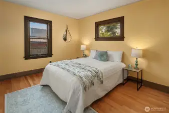 One of two main floor bedrooms. Lovely hardwood floors and original trim.