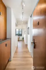 Entry has custom cabinetry pictured & large closet on the right.