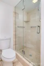 Guest bath shower and toilet.