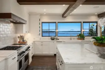 Chefs kitchen with Wolf, Sub Zero, Calacutta slab marble and more views!