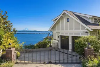 Gated drive to two car garage.
