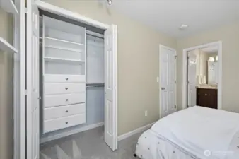 Closet built-ins for plenty of storage and private full bathroom