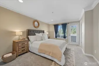 Spacious primary bedroom with access to TWO decks.