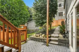 Separate entrance to the ADU...Step outside to discover an oversized lot with level entry and an attached garage. The large view deck is perfect for soaking in the beauty of Bellevue’s eastern skyline, Lake Washington, and the Cascade range. Juliette balconies and French doors throughout the home create a seamless connection between indoor and outdoor living