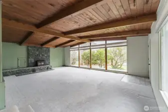 Spacious Sunk - In Living Room with natural lighting