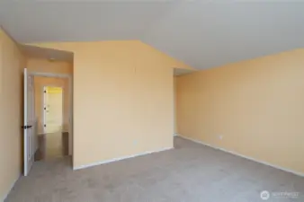 Primary bedroom with new neutral carpeting