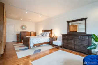 Master suite with built in cabinetry.