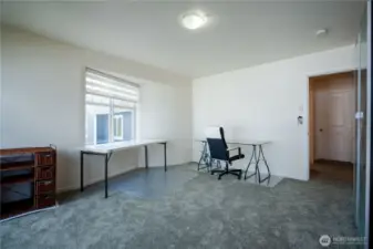 Upstairs bedroom, office or craft room.