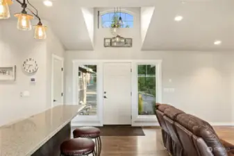 Entryway has a lovely transom for extra natural light.