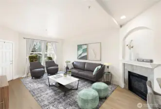 Enter into a spacious living room with fireplace and plenty of sunlight to brighten any day. Newly installed LVP flooring throughout adds to the light airy living! (Virtual Staging)