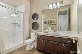 3/4 bath with a large shower in the 2nd Primary suite on main.