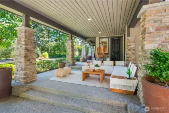 Charming covered front porch with stately columns.