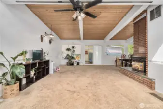 Enter from the breezeway slider into your large living room