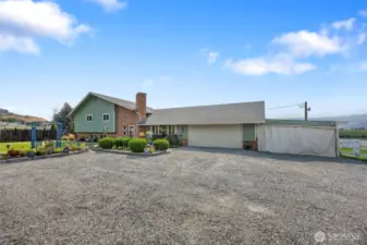 Covered parking for 4 cars and plenty of room for RV, friends, etc