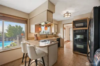 Eat up bar seating and a view of the pool? Yes please!