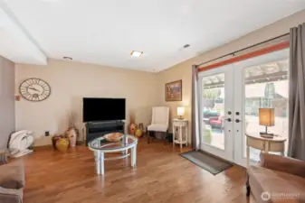 Downstairs family room with slider to covered patio