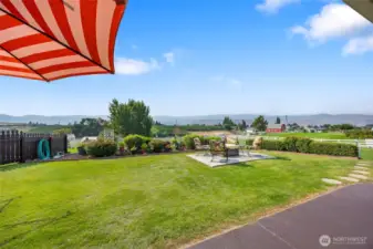 Level yard with sitting area to really take in the views!