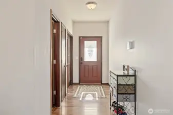 The front door window casts a pretty shadow on the entryway floor, showing off just how much light this home gets.