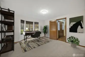 Virtually staged den/office or possible 5th bedroom.