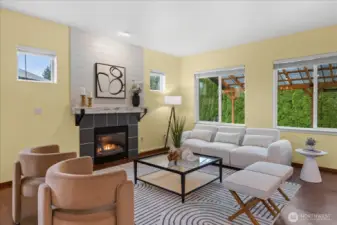 Large living room with fireplace, shiplap & reclaimed wood mantle.
