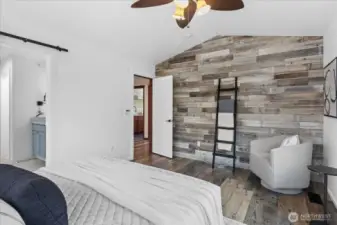 Shiplap wall in primary adds charm and warmth.