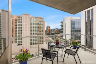 Step out for fresh air & city views on your private covered balcony.