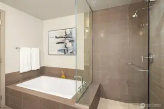 Walk-in shower + separate soaking tub for relaxing your cares away.