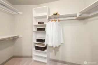 Walk-in closet with built-in organizers for all of your favorite things.