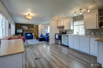 Luxury vinyl plank flooring, updated kitchen and newer windows