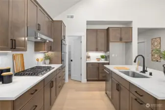 Kitchen with plenty of storage and walk in pantry.