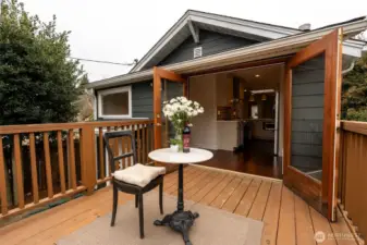 Or sneak through the French Doors to the backyard deck