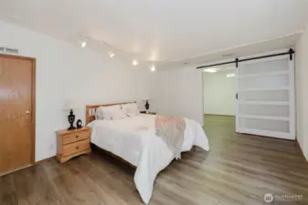 The generously sized primary bedroom offers plenty of space for relaxation and customization.