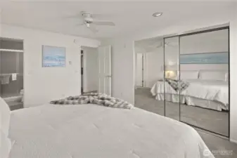 Primary bedroom features a view to the Kirkland marina and lake, and a ¾ ensuite bathroom.
