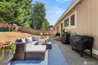 Spacious backyard and patio, ideal for outdoor dining and entertaining.