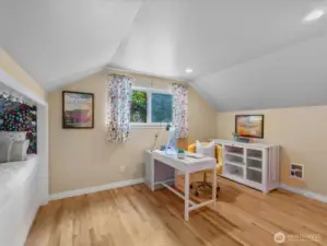 Also upstairs, a bonus bedroom offers flexibility for whatever life needs—be it a quiet home office, nursery, guest suite, or creative space.