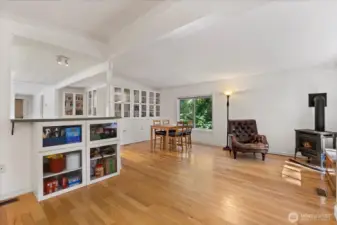 Living room area with a propane stove.