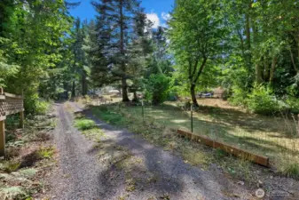 Left side of the circular driveway.