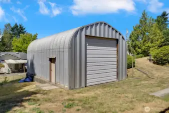 19 x 32.5 inside sq. ft.  (I know, good uniform numbers.) Door is 12 x 12.  Uses are semi- endless.