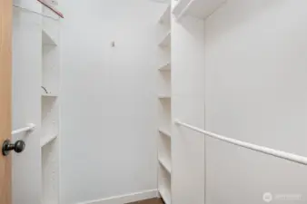 Primary suite walk-in closet.