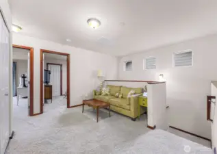 Loft area landing at the top of the stairs provides options for second living space, office, exercise space or whatever you desire!