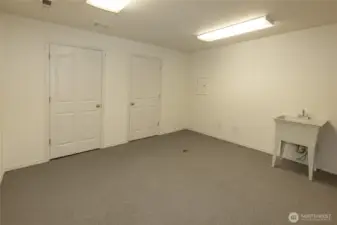 Lower level storage, or maybe a great hobby room